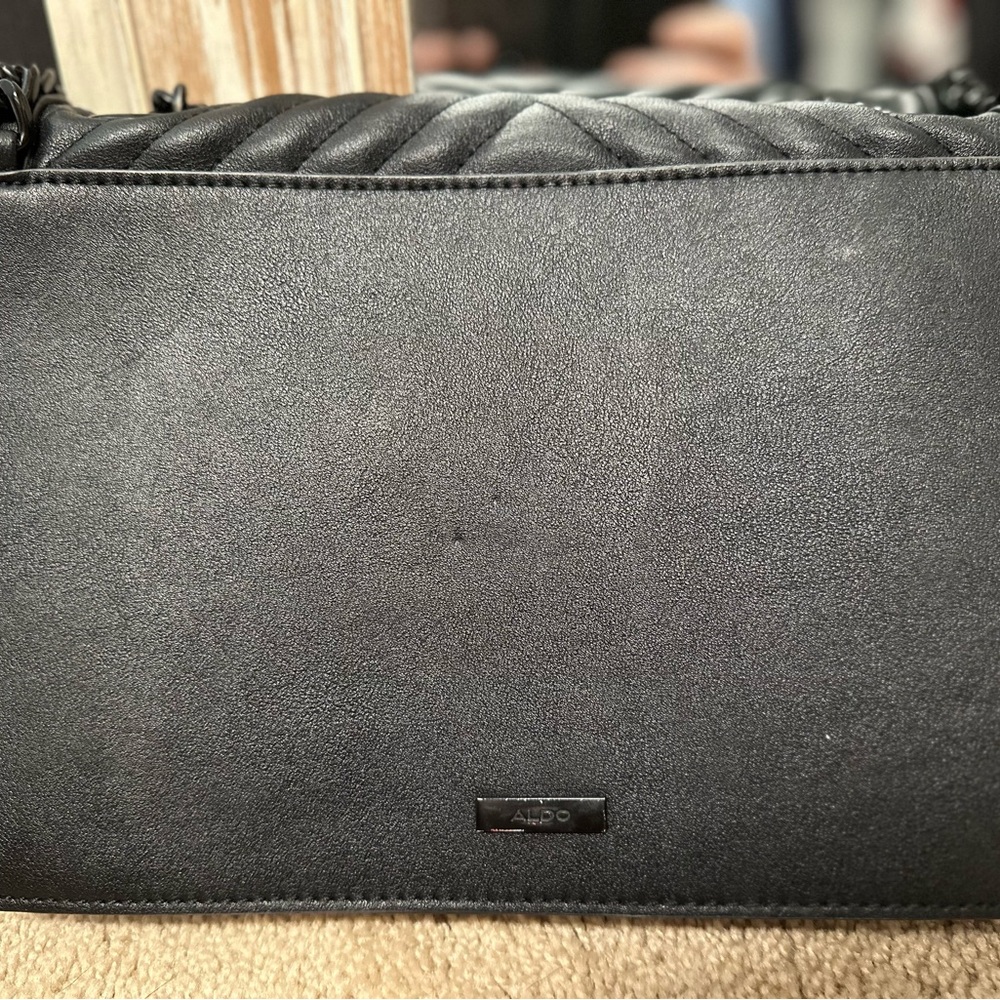 Also purse with metal straps